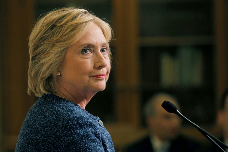 Image: U.S. Democratic presidential candidate Hillary Clinton speaks to reporters after holding a \"National Security Working Session\" with national security advisors in New York