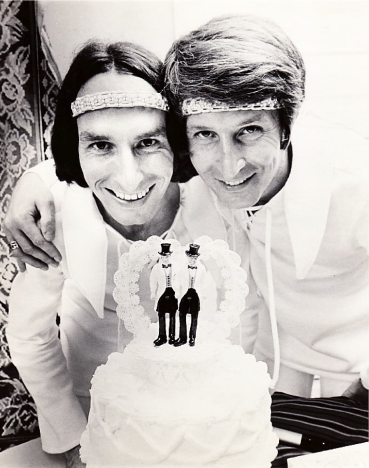 Michael McConnel (left) and Jack Baker with their wedding cake on September 3, 1971.