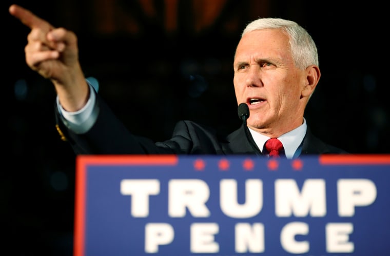 Image: Indiana Governor Mike Pence, the Republican vice presidential nominee, speaks during a rally in Charlotte