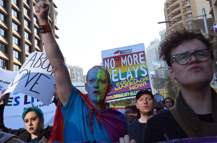 Image: Pro-gay marriage supporters shout for their rights during a rally in Sydney