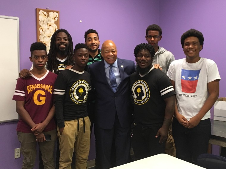 Antwon Cooper and Corey Witherspoon, Seeds of Promise mentors pictured with mentees of Renaissance Academy High School and Congressman Elijah Cummings.