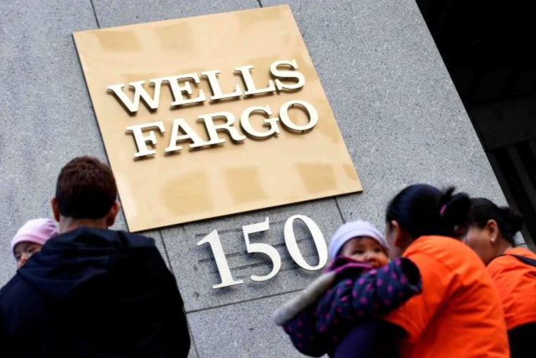 Protestors gather outside the Wells Fargo &amp; Co corporate campus in New York