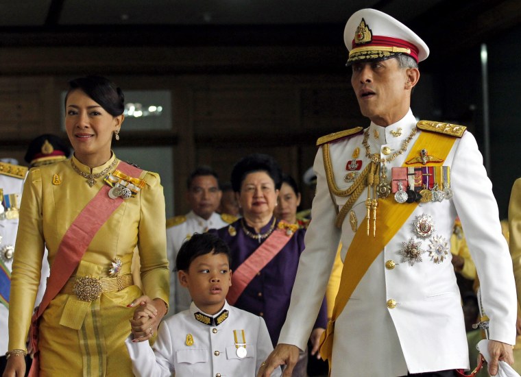 Image: Royal consort Princess Srirasm, Prince Dipangkorn Rasmijoti and Crown Prince Maha Vajiralongkorn in 2011