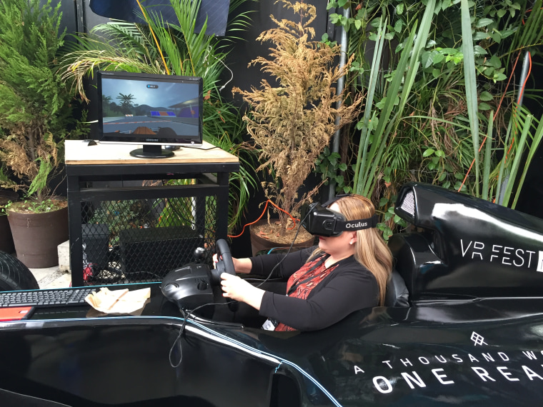 Cathy Hackl tries out a Formula 1 virtual reality experience.