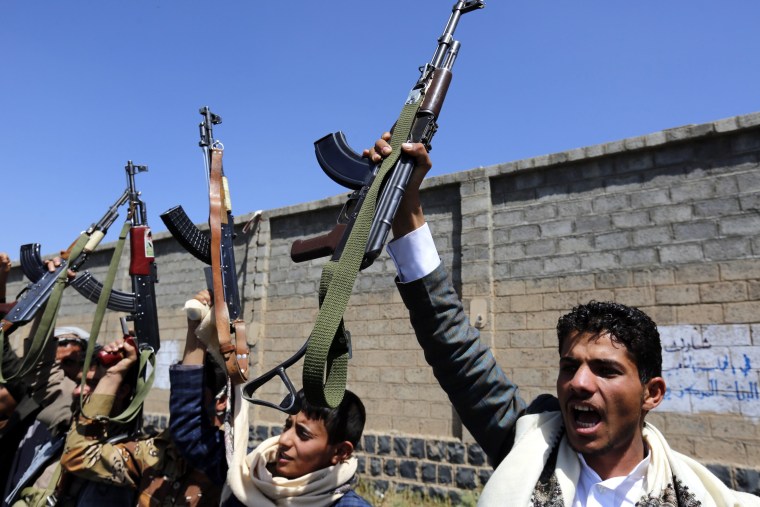 Image: Armed Houthis brandish weapons in Sanaa, Yemen, on Oct. 2.