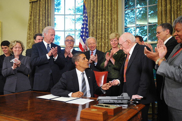 US President Barack Obama hands to gay r