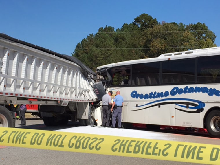 A tour bus with 48 people aboard collided with a truck