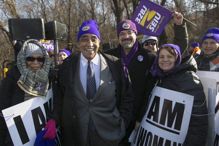 Hazel Ingram (far left) stands beside Rep. Charlie Rangel (D-NY) at a MLK Day rally on behalf of airport workers in New York, NY in January 2015. Ingram is known for never missing an event hosted SEIU 32BJ union workers.