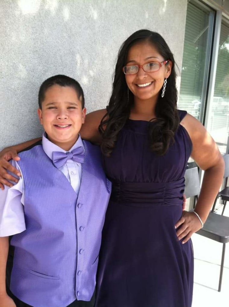 Dylan and Josette, all dressed up and all smiles.