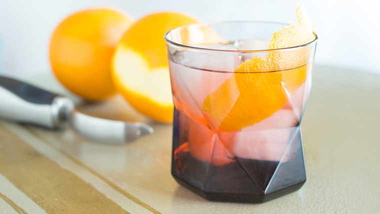 Negroni with an orange twist made with a vegetable peeler