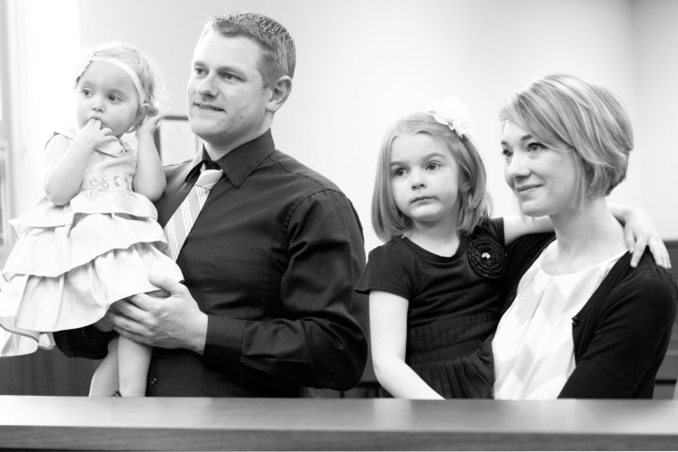 Rachel Lewis with her family: Husband Ryan, and daughters Madelyn and Leyla.