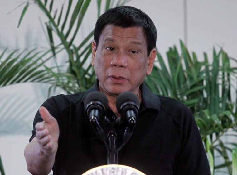 Image: Philippines President Rodrigo Duterte gestures during a news conference upon his arrival from Vietnam trip at the International Airport in Davao city