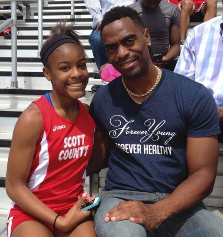 Image: Trinity Gay with her father Tyson Gay
