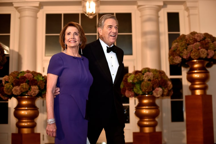 Image: Congresswoman Nancy Pelosi and Paul Pelosi arrive for a State Dinner honoring Italian Prime Minister Renzi at the White House in Washington