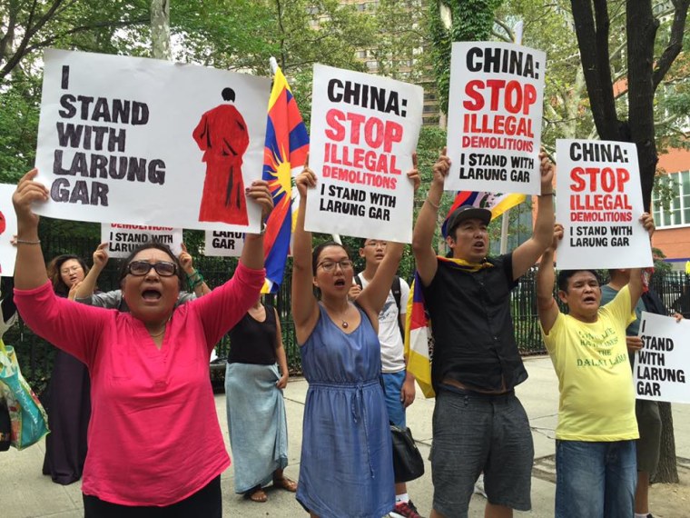Members of the Tibetan community, Students for a Free Tibet, and Tibetan Youth Congress show their support for Larung Gar outside the Chinese Mission to the United Nations in New York City in a photo dated Aug. 10, 2016.