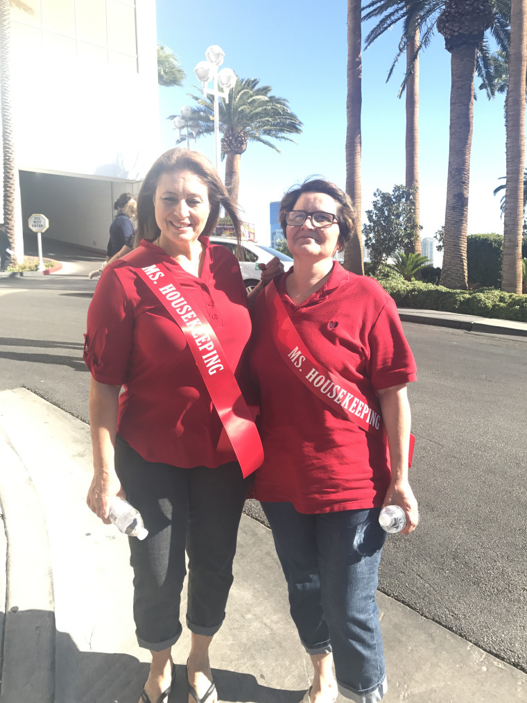 Protesters wearing "Ms. Keeping" sashes out front of the Trump International Hotel in Las Vegas.