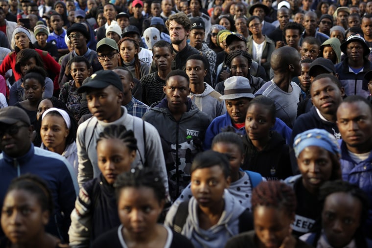 Image: Students listen to Economic Freedom Front (EFF) activist and student leader Vuyani Pambo