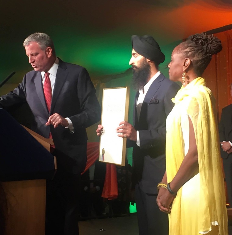 Ahluwalia (center) with New York City Mayor Bill de Blasio (left) and the First Lady of New York City Chirlaine McCray.