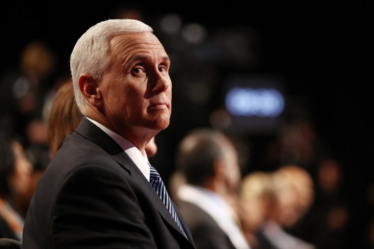 Image: Mike Pence waits for the start of the third debate.