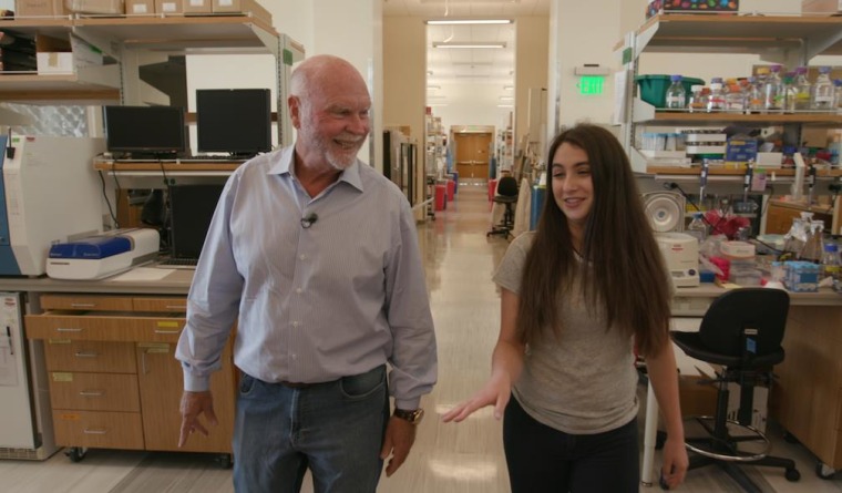 J. Craig Venter and Casey Longstreet walk through one of the laboratories of the J. Craig Venter Institute in La Jolla, California. Photo: NBC News.