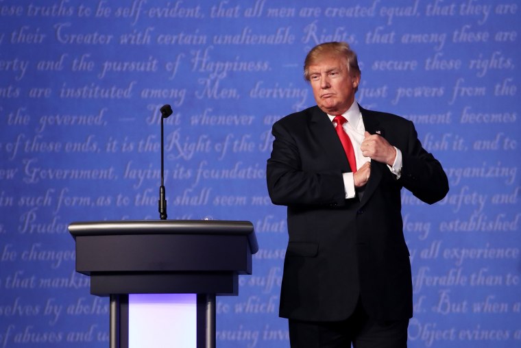 Image: Trump stands on stage after the third U.S. presidential debate
