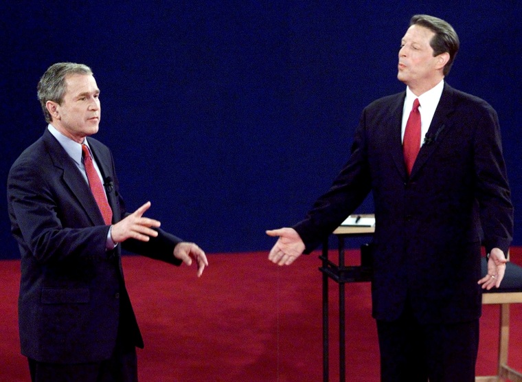 Image: George W. Bush and Al Gore during debate on Oct. 17, 2000