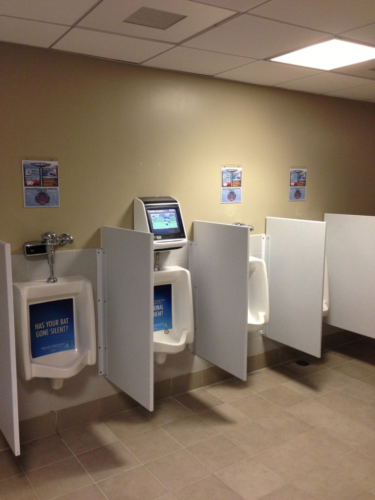 A motion-activated urinal game is the big play in the men’s restroom at Coca-Cola Park in Allentown, Pennsylvania.
