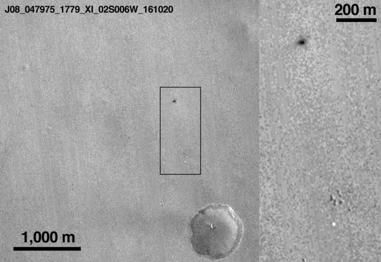 This annotated Oct. 20, 2016 image made available by NASA shows a spot, indicated by a rectangular box, that likely appeared in connection with the Oct. 19, 2016 Mars arrival of the European Space Agency's Schiaparelli test lander. On Friday, Oct. 21, 2016, the ESA said their experimental Mars probe hit the right spot -- but at the wrong speed -- and may have ended up in a fiery ball of rocket fuel when it struck the surface. This view was captured by NASA's Mars Reconnaissance Orbiter.
