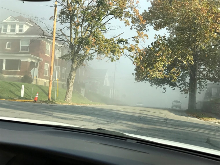 Image: A fog plume believed by authorities to contain chemicals is seen after a chemical spill at a facility in Atchison