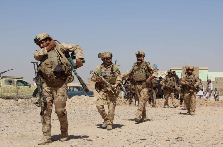 Image: Afghan National Army commandos take position