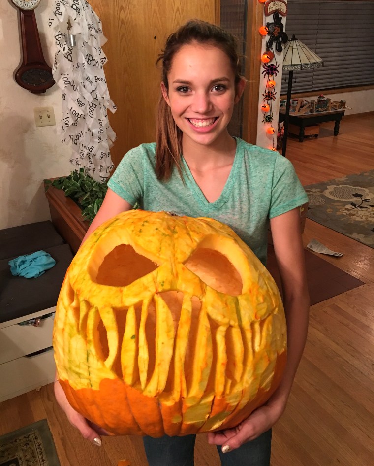 Girl Gets Head Stuck In Pumpkin