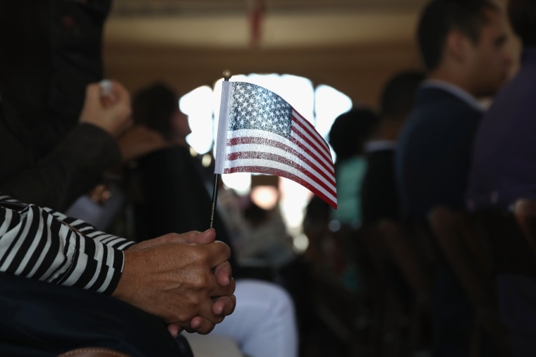 Image: Immigrants To U.S. Become Citizens During Naturalization Ceremony On Ellis Island