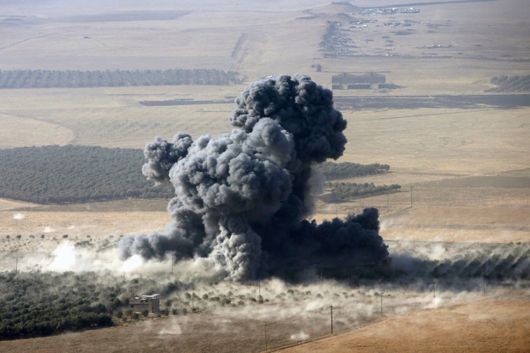 Image: Smoke rises from ISIS positions