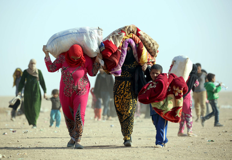 Image: TOPSHOT-SYRIA-IRAQ-CONFLICT-REFUGEES