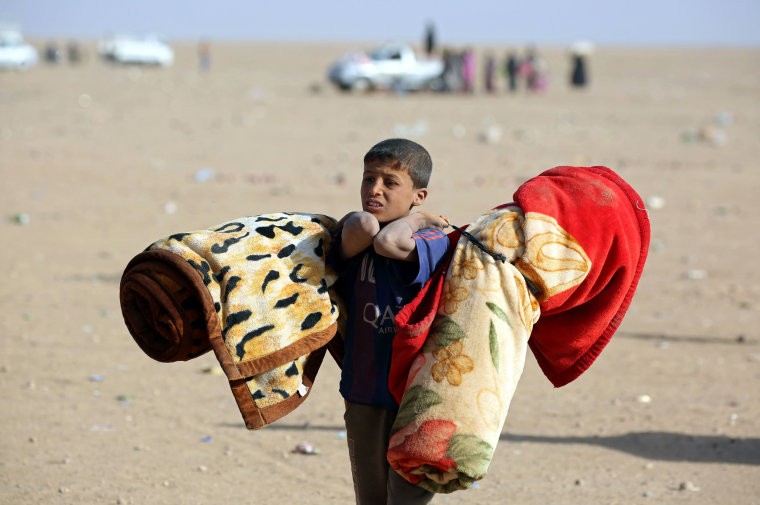 Image: TOPSHOT-SYRIA-IRAQ-CONFLICT-REFUGEES