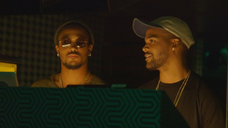 Romeo Miller, son of hip-hop legend Master P with fellow cast member Damon "Boogie" Dash, the namesake of Roc-A-Fella co-founder and media mogul, Damon Dash during a scene from "Growing Up Hip Hop."