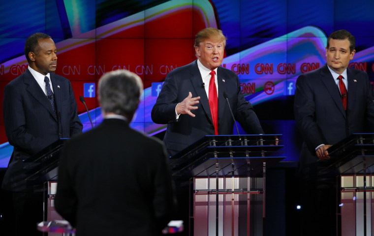 Image: Republican U.S. presidential candidate businessman Trump responds to a question from moderator Blitzer as Carson and Cruz look on during the Republican presidential debate in Las Vegas