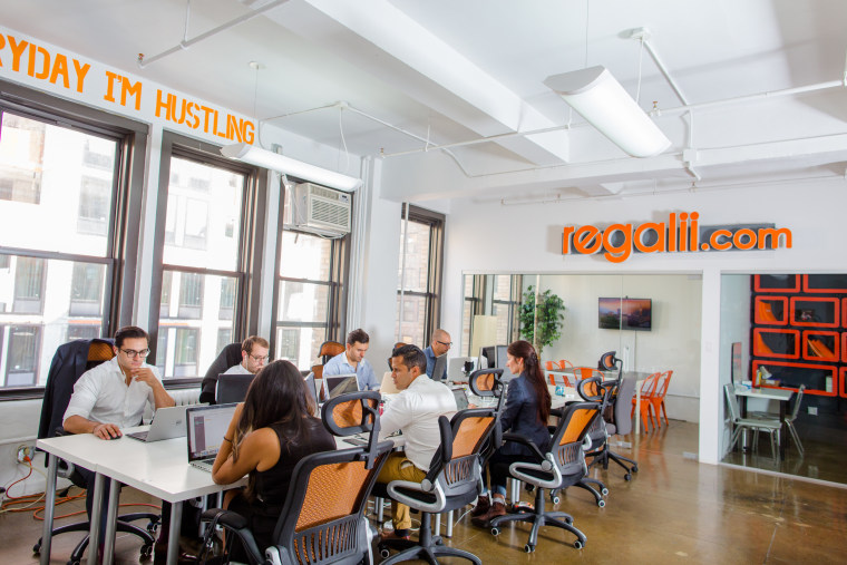 A picture of the Regalii team in their New York City offices. Their technology platform serves the $3 trillion global and domestic bill payments market.  