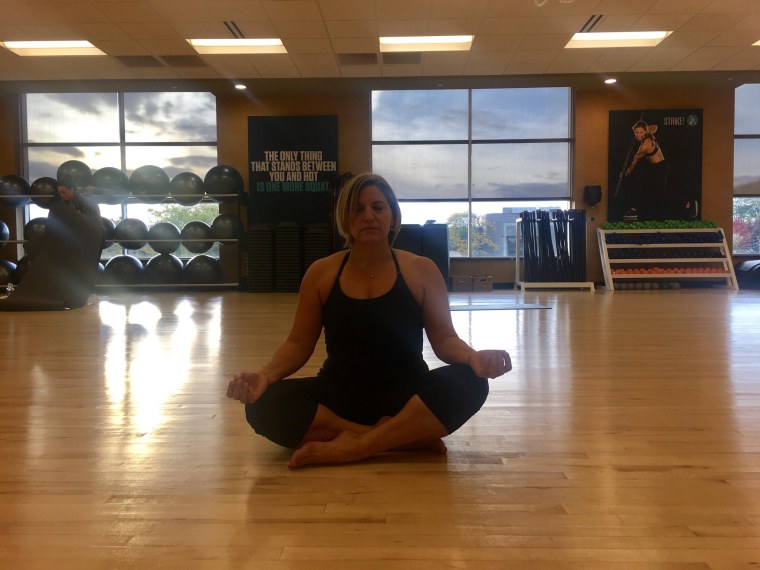 Detroit resident Margarita Bauzá is doing yoga to keep calm during the high-stakes political season. 