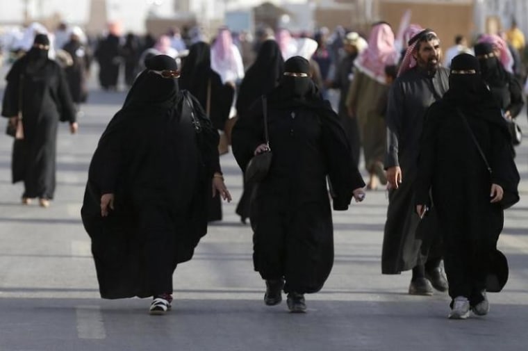 Saudi women arrive to attend Janadriyah Culture Festival on the outskirts of Riyadh