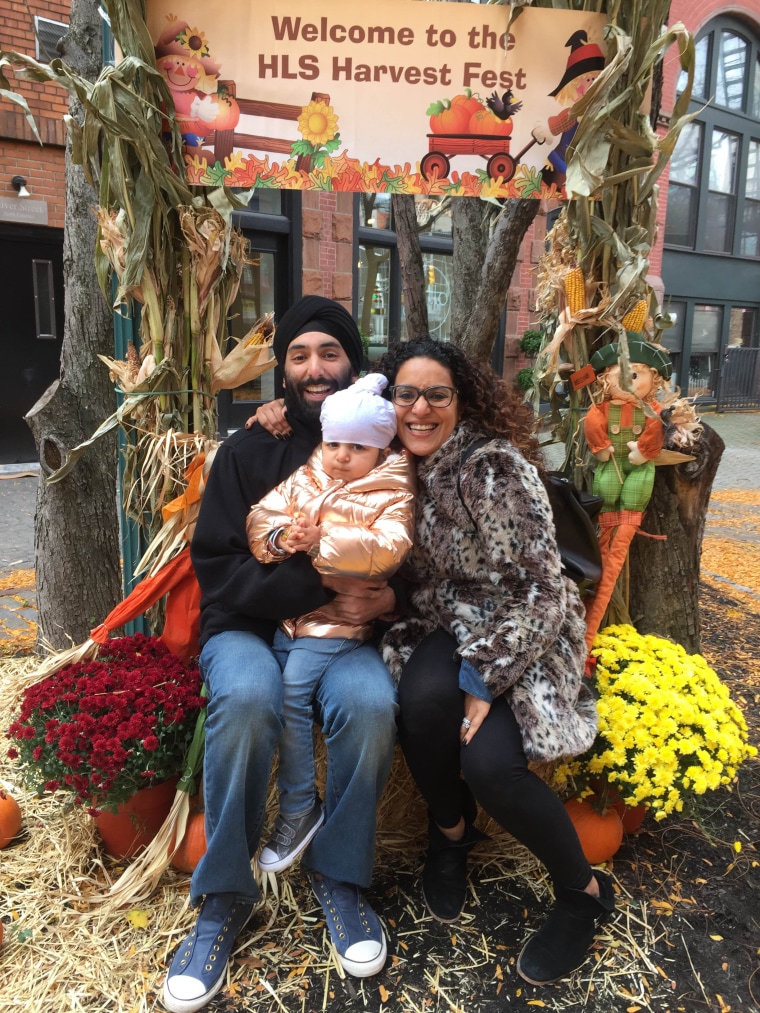 Again Singh and Raakhee Mirchandani with their daughter, Satya