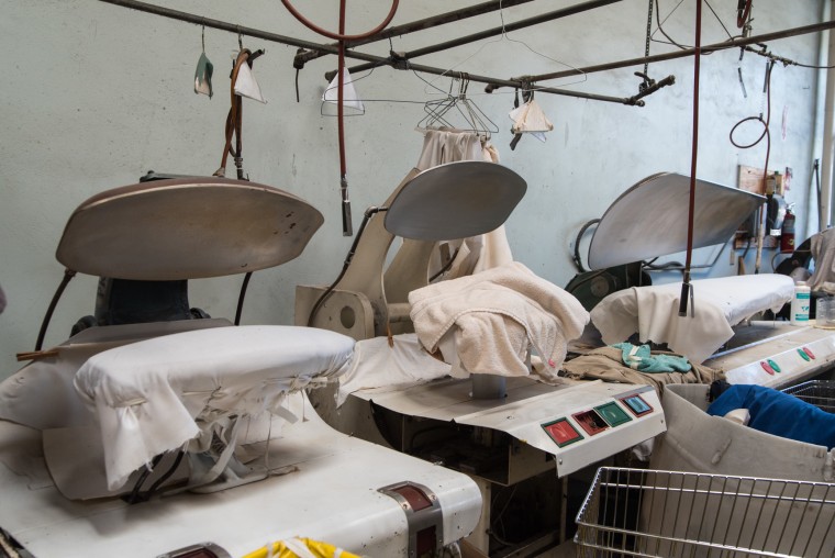 Laundry pressing machines inside Ching Lee Laundry, which closed its doors after 140 years on October 29, 2016.