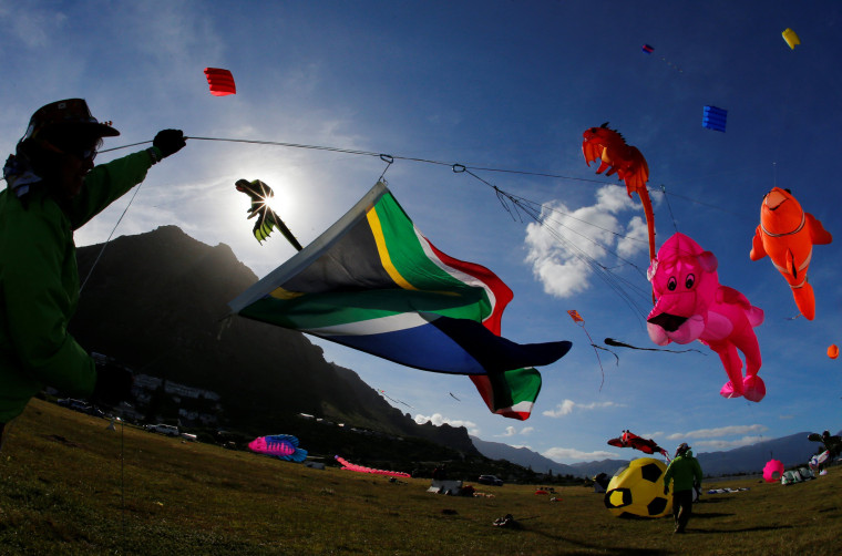 Image: Kites of all shapes and sizes fill the air at the 22nd Cape Town International Kite Festival in Cape Town, South Africa