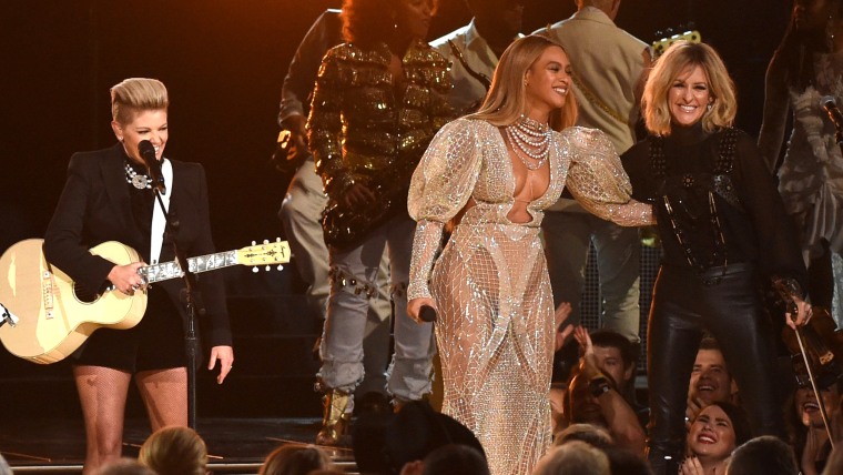 Beyonce performs onstage with Emily Robison, Natalie Maines, and Martie Maguire of Dixie Chicks at the 50th annual CMA Awards at the Bridgestone Arena on November 2, 2016 in Nashville, Tennessee.