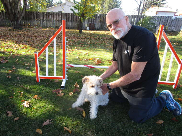 Veteran Jack Cotter and champion agility dog, Tucker