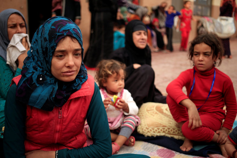 Image: Women and children who fled ISIS-held Hawija