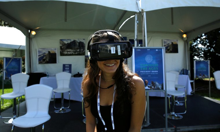 Image: Woman wears virtual reality device for SXSL festival at the White House in Washington