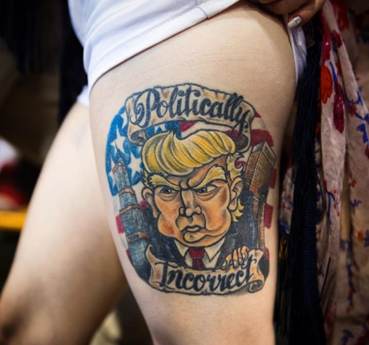 Image: Jennifer Pitta, of Scranton, Pa., shows off a tattoo of Donald Trump