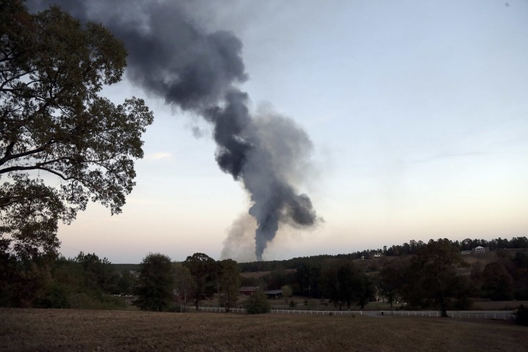 Image: Smoke rises into the sky from a gas line explosion in western Shelby County