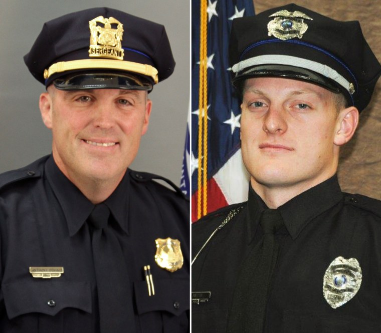 From left, Officers Tony Beminio of the Des Moines Police Department and Justin Martin of the Urbandale Police Department.